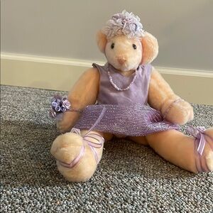 Cream bear ballerina with purple dress/tutu and flowers